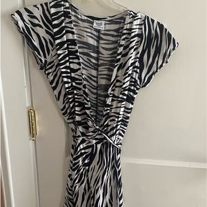 Zebra print cotton wrap dress from Italy. Flattering, slightly above the knee.